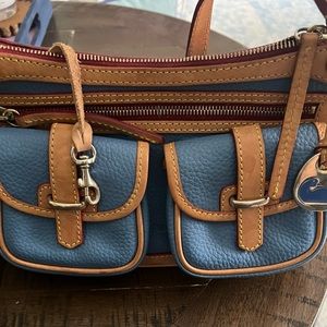 Light blue Dooney & Bourke shoulder strap purse, multiple pockets